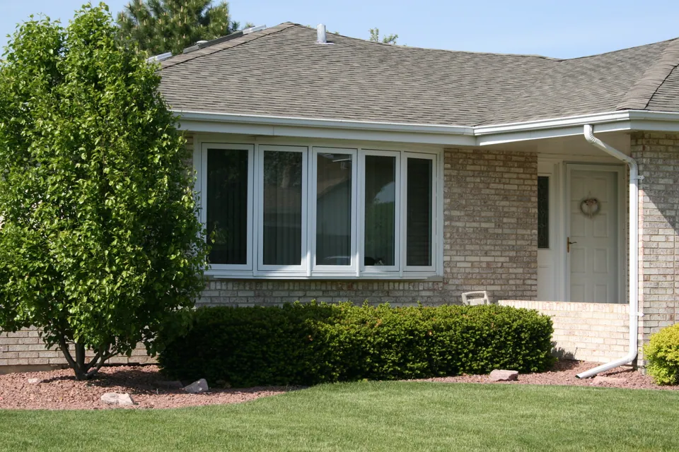 Bay/bow window projecting from a Chicagoland south-suburb brick home — an Excel install