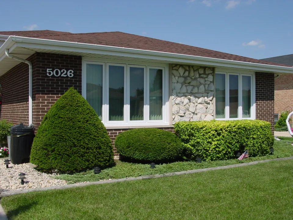 Casement windows on a Chicagoland south-suburb brick ranch — an Excel install